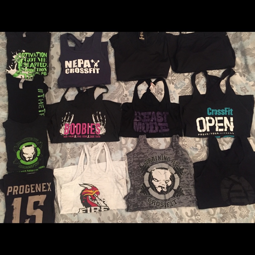 5 Workout tee shirts & 9 workout tank tops. SOLD
